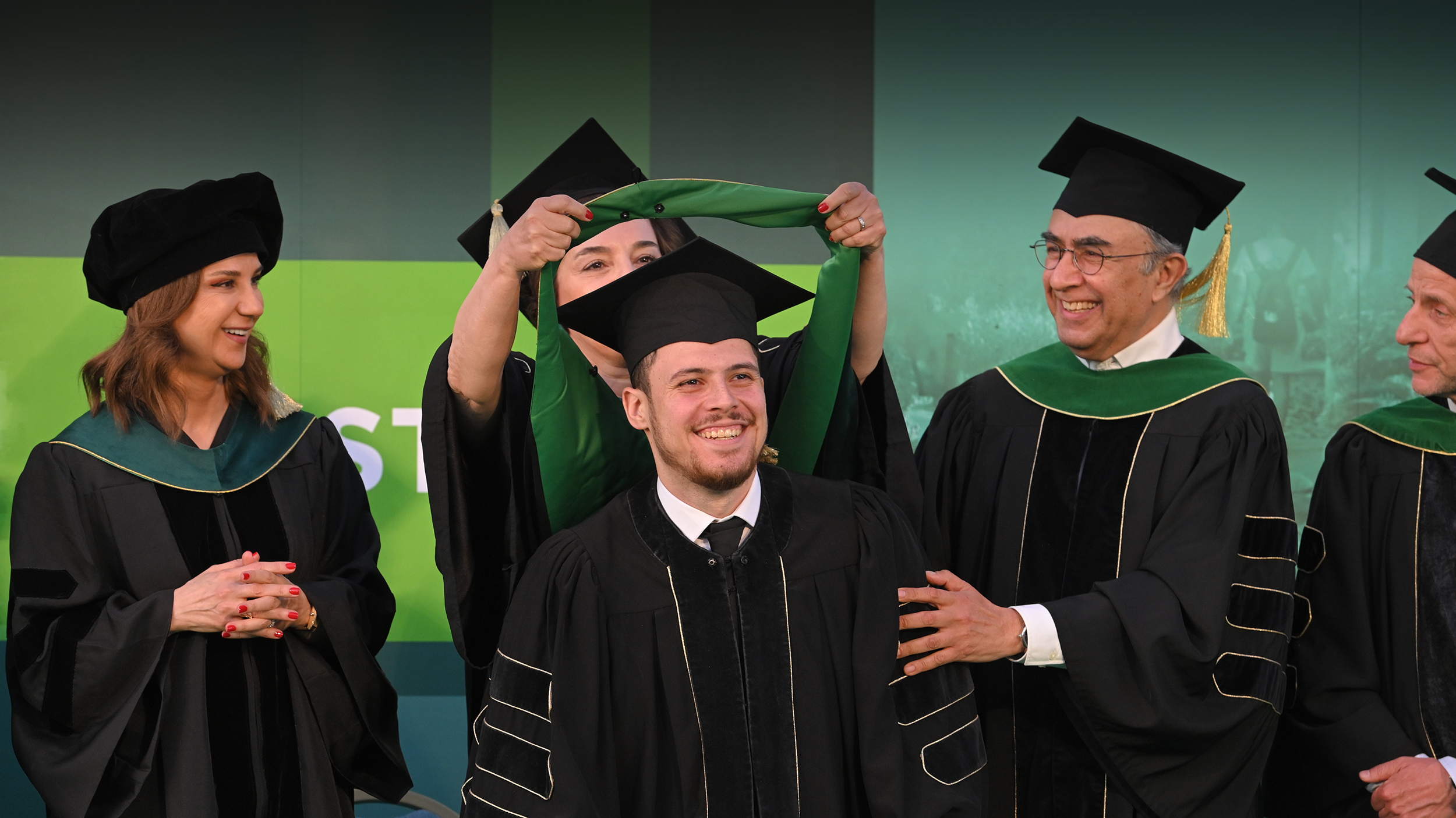 [hero-medicine-hooding-2026-pano-new2.jpg]